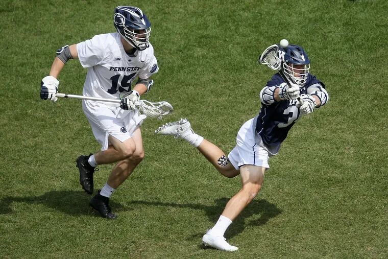 Yale's Christian Cropp (34) scores a goal in front of Penn State's Robby Black (15) in the first quarter during their NCAA men's Division I lacrosse semifinal game at Lincoln Financial Field in South Philadelphia on Saturday, May 25, 2019.