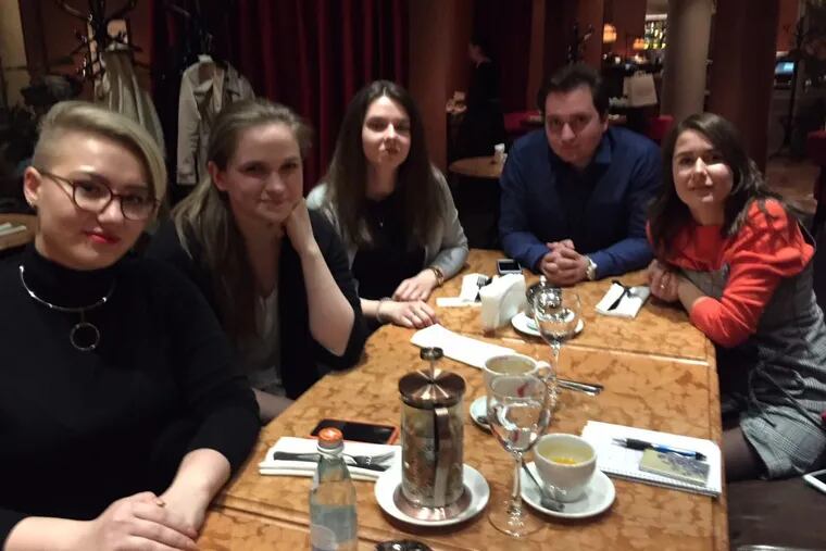 Russian students and young journalists ponder their future at a cafe in Moscow.