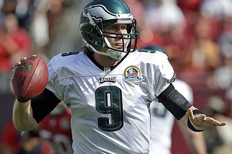 Nick Foles (9) throws a pass during the first quarter of an NFL football game against the Tampa Bay Buccaneers Sunday, Dec. 9, 2012, in Tampa, Fla. (Chris O'Meara/AP)