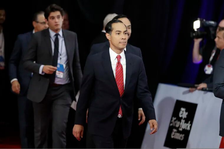 Democratic presidential candidate former Housing Secretary Julian Castro walks to be interviewed following a Democratic presidential primary debate hosted by CNN/New York Times at Otterbein University, Tuesday, Oct. 15, 2019, in Westerville, Ohio. (AP Photo/Tony Dejak)
