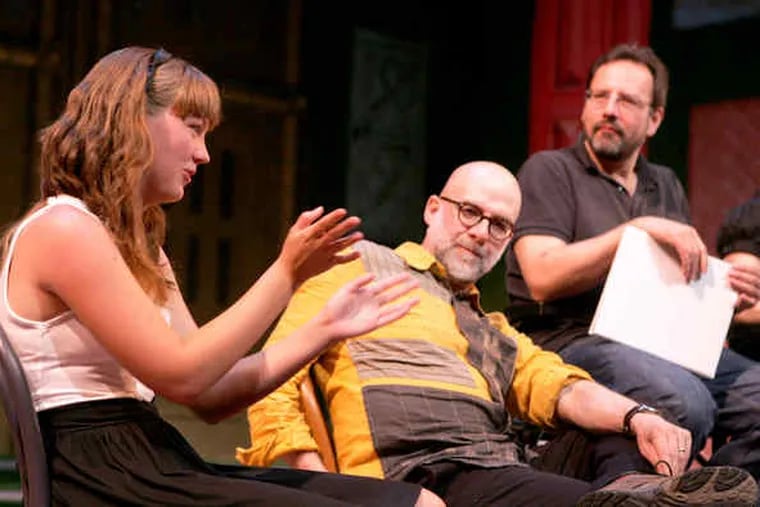 As a winner in the Philadelphia Young Playwrights Development Series, Haley Gordon fields audience questions at the Wilma Theater. Director Walter Bilderback (center) helped hone the work. Joe Guzman (right) and other actors read it onstage.