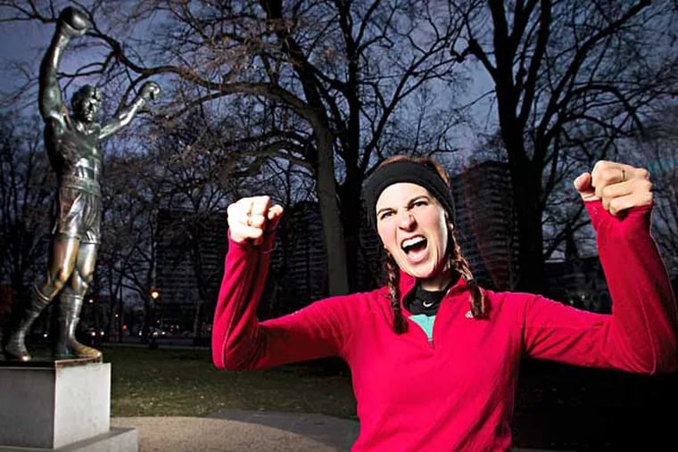 Rebecca Schaefer is organizing a Rocky 2 themed ultrarun following the course run by Sylvester Stallone in his movie series. Photograph taken of Rebecca in front of the Rocky statue, Philadelphia Art Museum on Tuesday, December 3, 2013. ( ALEJANDRO A. ALVAREZ / STAFF PHOTOGRAPHER )