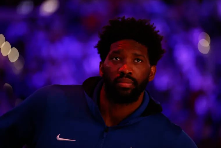 Sixers center Joel Embiid during player introductions before the Sixers played the Minnesota Timberwolves on Saturday, November 27, 2021 in Philadelphia.