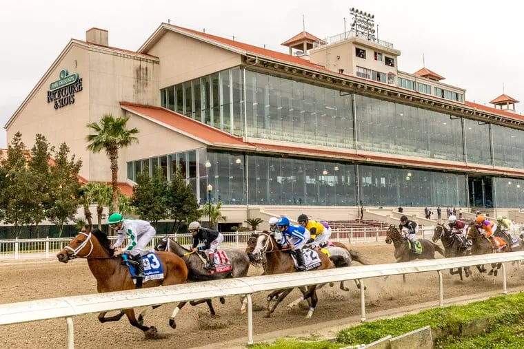 Wells Bayou (left), ridden by jockey Florent Geroux, took an early lead and held off NY Traffic to win he 107th running of the $1,000,000 Grade II Louisiana Derby on March 21, 2020.