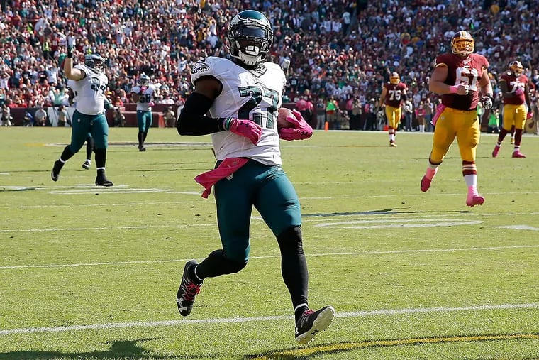 Malcolm Jenkins scores a touchdown against the Redskins.