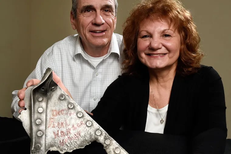 Dennis and Eileen Kirban of Kintnersville with a piece of a Japanese plane that attacked Pearl Harbor. Her father, Nicholas Tinari Jr., a U.S. Army soldier, took it from the wreckage after the attack.