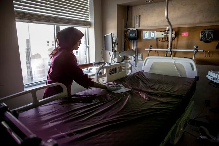 A hospital bed is cleaned at St. Cloud Hospital in St. Cloud, Minn.