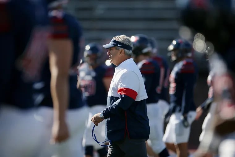Penn head coach Ray Priore watching his players warm up before a game against Brown at Franklin Field on Nov. 2, 2019.