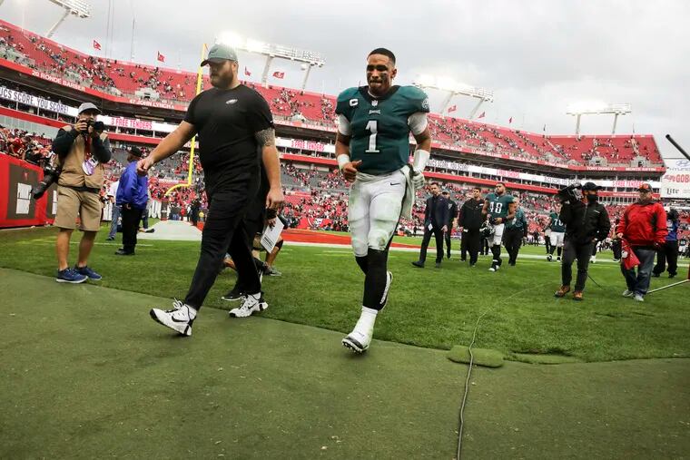Philadelphia Eagles quarterback Jalen Hurts (1) leaves the field after the Philadelphia Eagles and Tampa Bay Buccaneers Wild Card game at Raymond James Stadium in Tampa, Fla. on Sunday, January 16, 2022.