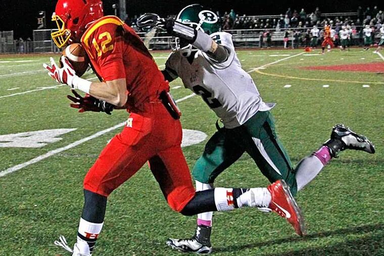 Haverford's Nick Costello catches a pass in front of Ridley's Jaasir
Minor. (Ron Cortes/Staff Photographer)