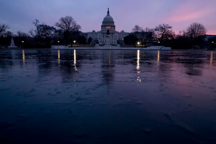 This Feb. 9, 2018,  photo shows the Capitol Dome of the Capitol Building at sunrise in Washington. The federal budget deficit surged to $779 billion in fiscal 2018, its highest level in six years as President Donald Trump's tax cuts caused the government to borrow more heavily in order to cover its spending. This year’s deficit is set to blast through $1 trillion.(AP Photo/Andrew Harnik, File)