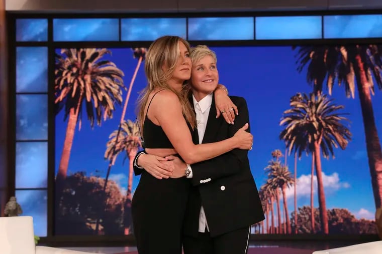 Talk show host Ellen DeGeneres, right, is embraced by Jennifer Aniston during the final taping of "The Ellen DeGeneres Show" at the Warner Bros. lot in Burbank, Calif.