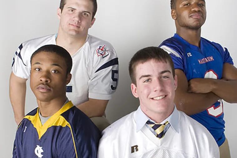 The Daily News' All-City football team: Malvern Prep's Billy Conners (back left), Jules Mastbaum Tech's Rasheen Tookes (back right), West Catholic's Curtis Drake (front left) and La Salle's Drew Loughery (front right). (Jessica Griffin/Staff Photographer)