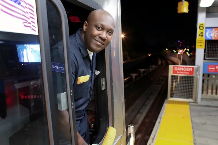 Train engineer Maurice Bey poses for a photo during the first night of SEPTA's late night subway service in Philadelphia, Saturday June 14, 2014.  (For the Daily News/ Joseph Kaczmarek)