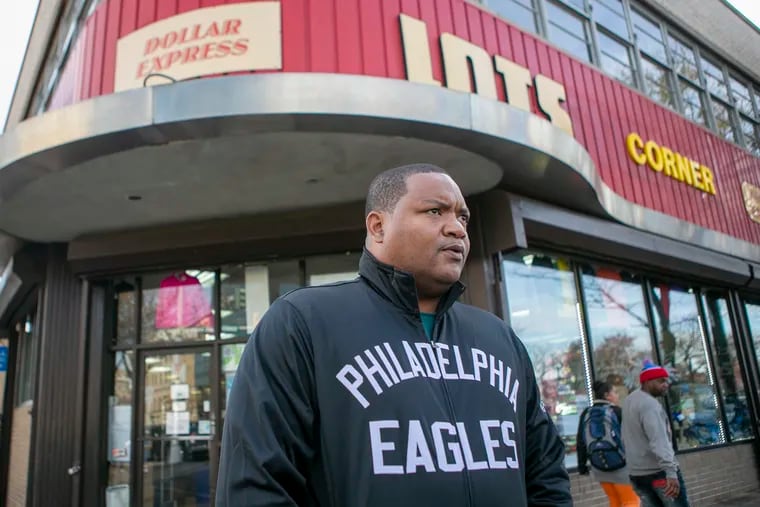 Atlantic City Mayor Marty Small stands in front of a store on Atlantic Avenue during a tour of the street with a Philadelphia Inquirer reporter in Atlantic City, N.J., on Monday, Nov. 11, 2019.