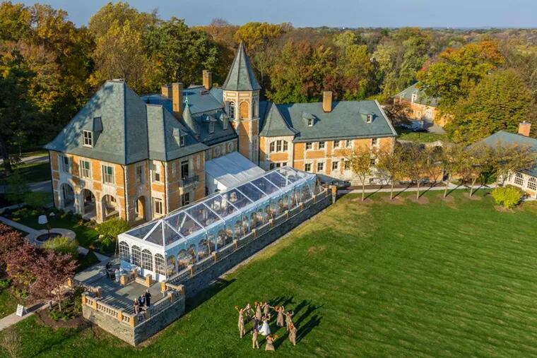 A drone camera captured this aerial view of the wedding of Tiffany DiFelice and Michael Papaneri at Cairnwood Estate in Bryn Athyn. Many couples are asking for such images of their nuptials, but occasionally there are complications - such as a drone that crashes into a participant. (RCHeliCam.com)