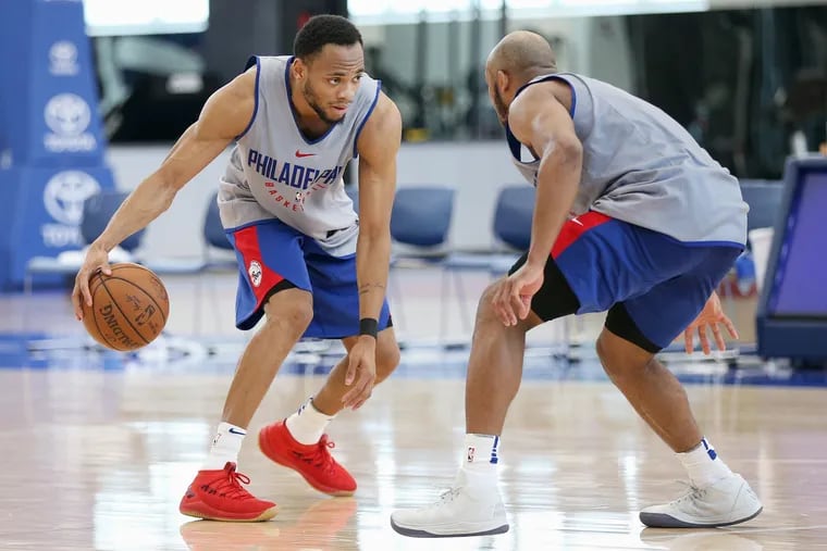 Miami guard Bruce Brown Jr., left, participates in a pre-draft workout with West Virginia guard Jevon Carter at the Sixers Training Complex in Camden, N.J., on Wednesday.