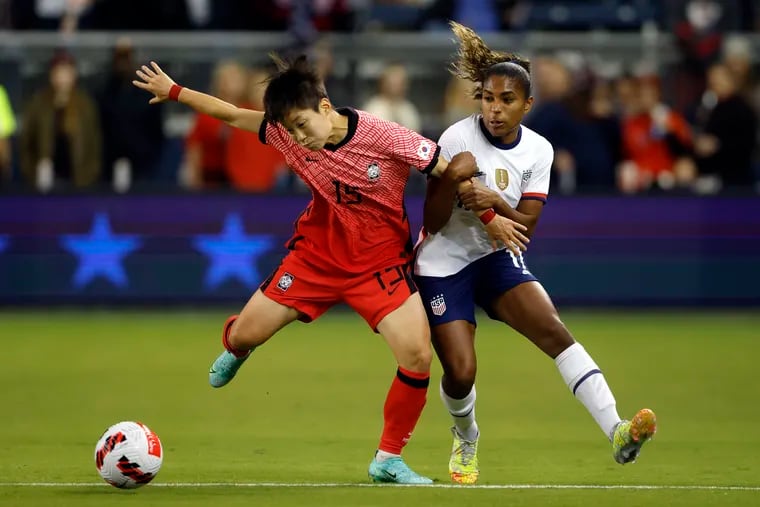 South Korea midfielder Park Yeeun (left) and the United States' Catarina Macario (right) battle for the ball during the first half.