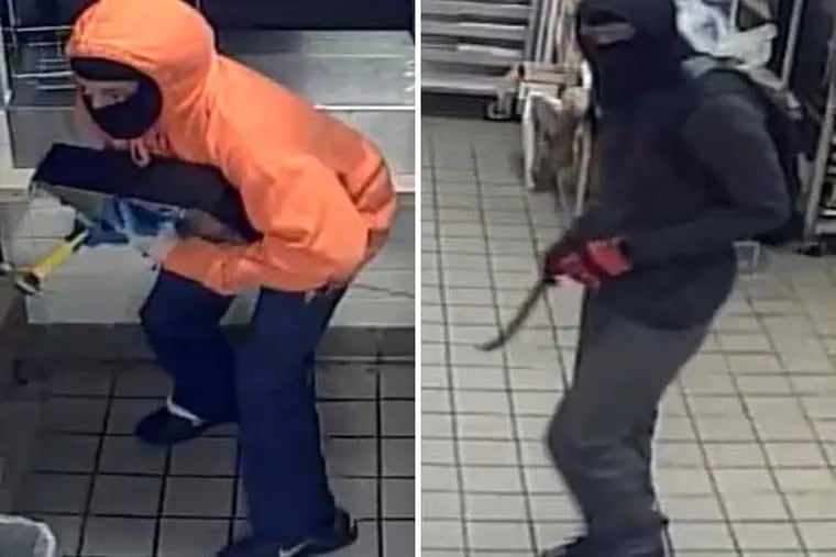 Police are looking for two suspects in a series of Dunkin' Donuts burglaries. (Photo courtesy of Gloucester Township police)