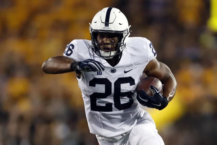 Saquon Barkley runs with the ball during the first half against Iowa on Sept. 23.