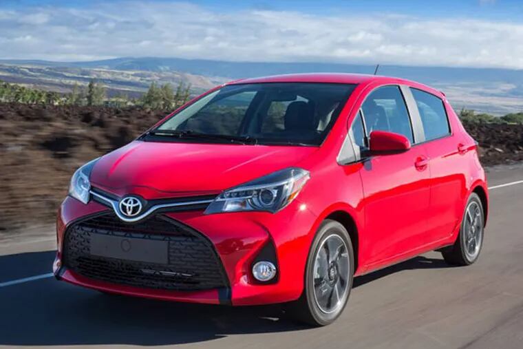 This undated photo made available by Toyota shows the 2015 Toyota Yaris car. The Yaris, available as three-door and five-door hatchbacks, continues to rank among the top 10 gasoline-powered, non-hybrid cars in fuel economy in the country. (AP Photo/Toyota, David Dewhurst Photography)