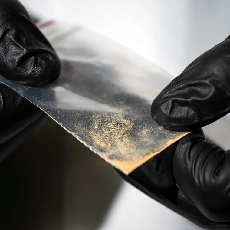 A sample of nitazene powder, a drug more potent than fentanyl, is examined at the Center for Forensic Science Research, a toxicology lab in Montgomery County, where a person recently died of an overdose involving a nitazene analogue.