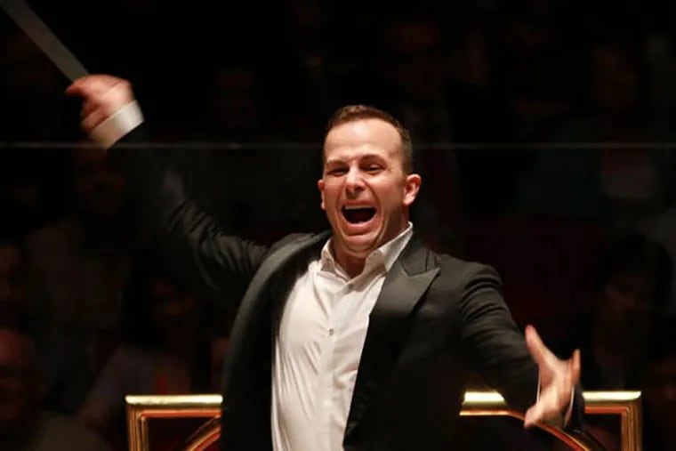 Music Director Yannick Nézet-Séguin conducts the Philadelphia Orchestra in a January 2014 concert at the Kimmel Center. (David Swanson / Staff Photographer)