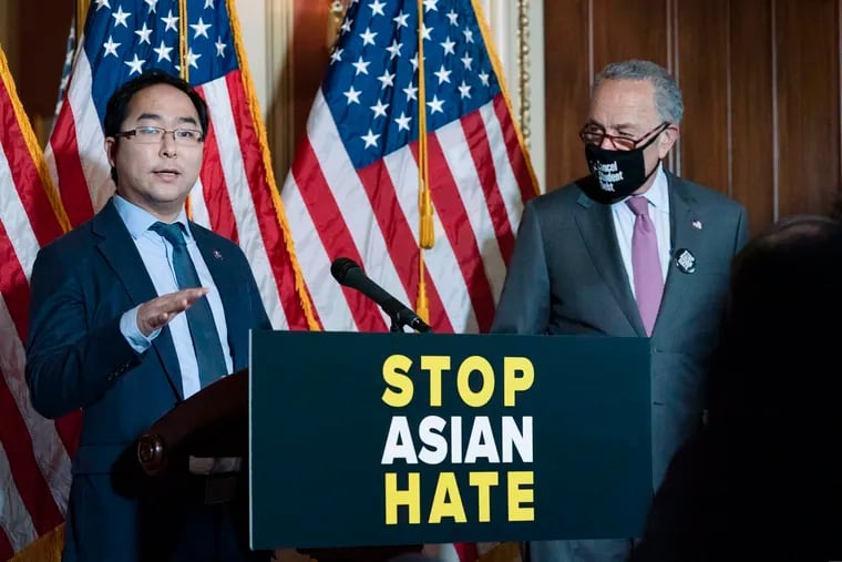 U.S. Rep. Andy Kim (left, D., N.J.), with Senate Majority Leader Chuck Schumer (D., N.Y.), during an April 13 news conference promoting an anti-Asian hate bill in Washington.