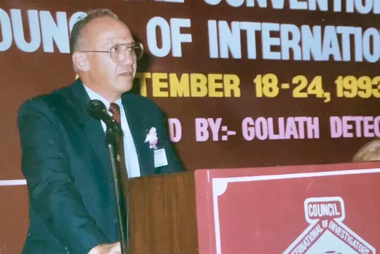 Mr. Brooker, shown here at a 1993 conference for the Council of International Investigators, spoke often at meetings and symposia around the world.