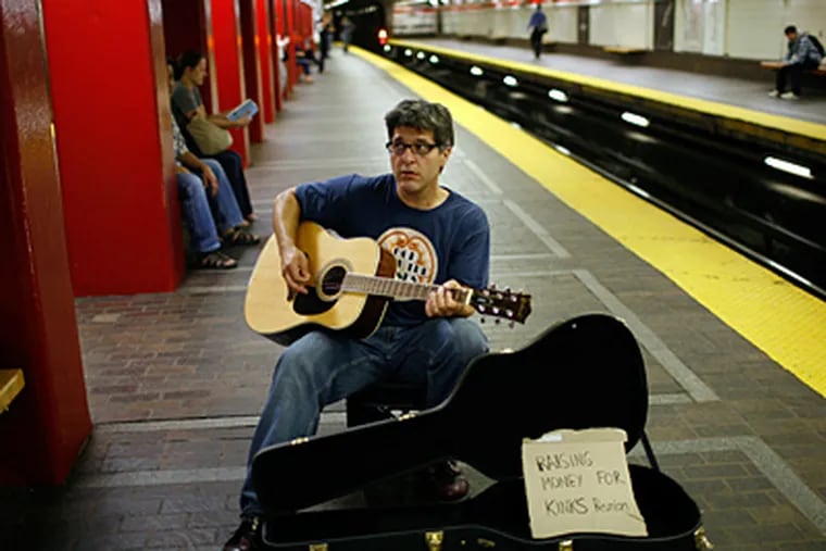 Rock fan and Boston Globe reporter Geoff Edgers sings Kinks tunes in the London Underground in the documentary. It airs Thursday night on WHYY TV12. (Geoff Edgers)