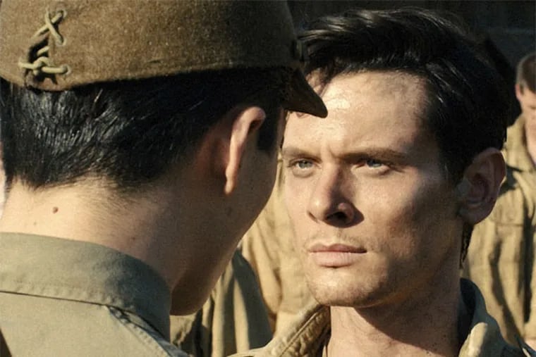 Jack O'Connell as Olympian and war hero Louis Zamperini in &quot;Unbroken,&quot; directed by Angelina Jolie. (Universal Pictures)