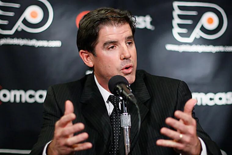 Coach Peter Laviolette has been using a system to break down the Flyers' remaining games. (AP Photo/Matt Slocum)