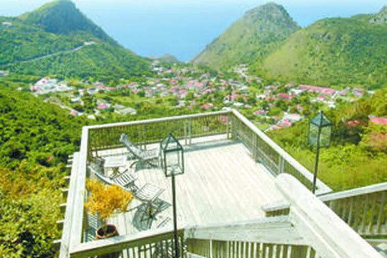 A deck at the Queen&#0039;s Gardens Resort provides a view of The Bottom, the capital of the 5-square-mile isle of Saba, a favorite of divers and hikers.