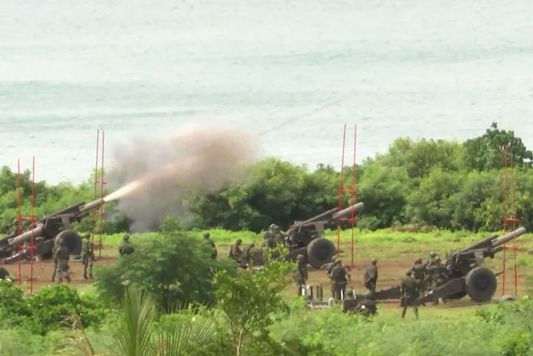 Taiwan's military conducts drills in Pingtung, southern Taiwan, on Tuesday.