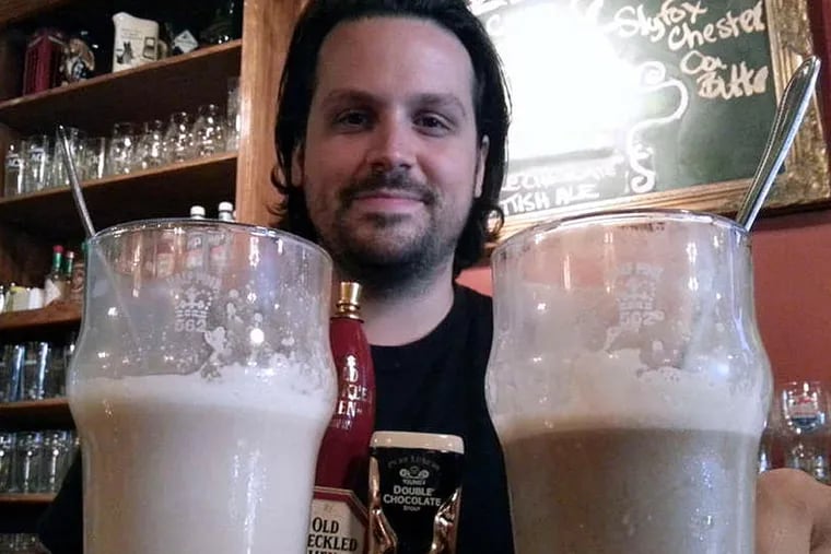 Edward Strojan of Victoria Freehouse shows off beer floats.