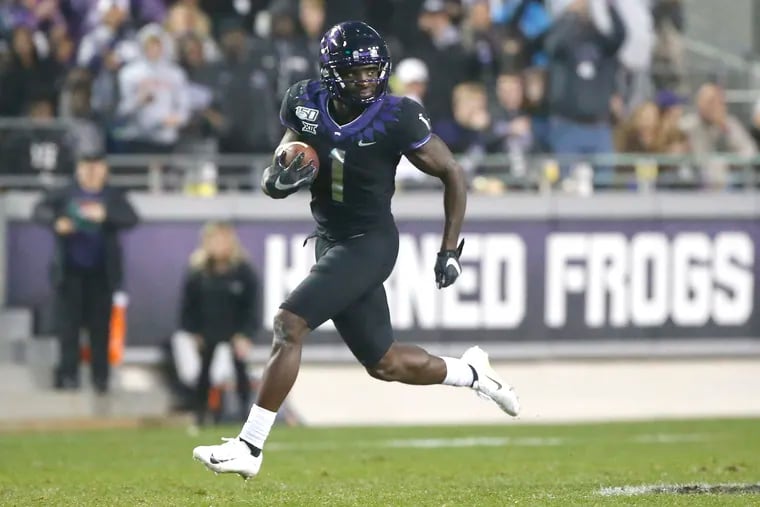 Jalen Reagor (1) of the TCU Horned Frogs returning a punt for a touchdown against the West Virginia Mountaineers on Nov. 29, 2019 in Fort Worth, Texas.