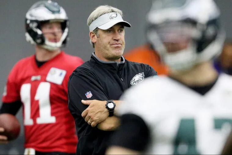 Eagles coach Doug Pederson watches his players during practice at the NovaCare Complex on Tuesday.