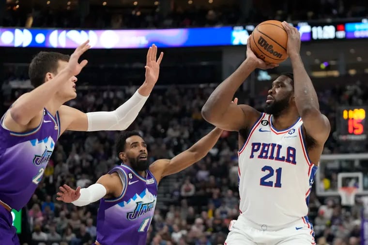 Sixers center Joel Embiid (21) takes a shot during the first half. Embiid finished with 30 points and seven rebounds.