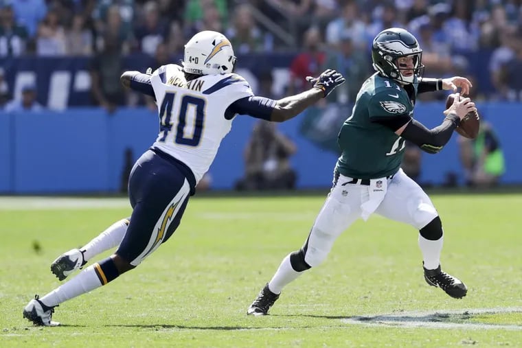 Eagles quarterback Carson Wentz was able to avoid trouble against the Chargers.