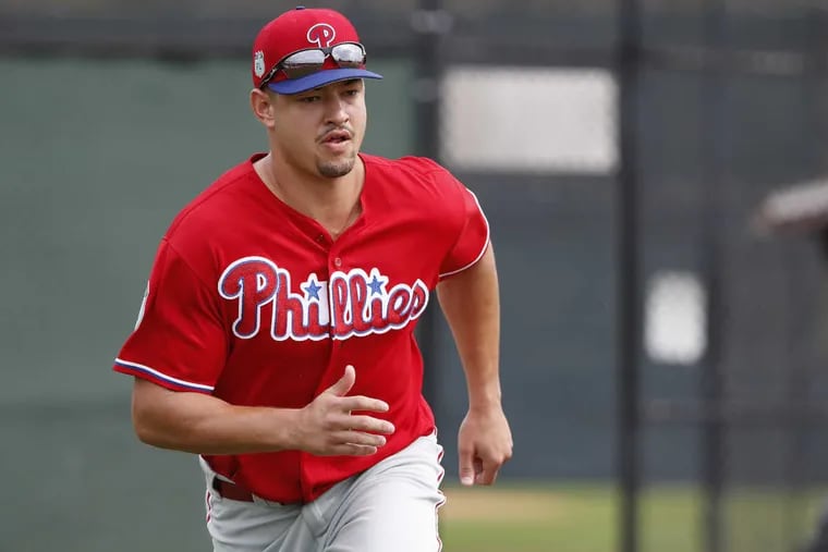 Phillies’ Dylan Cozens runs during a drill at Phillies spring training.