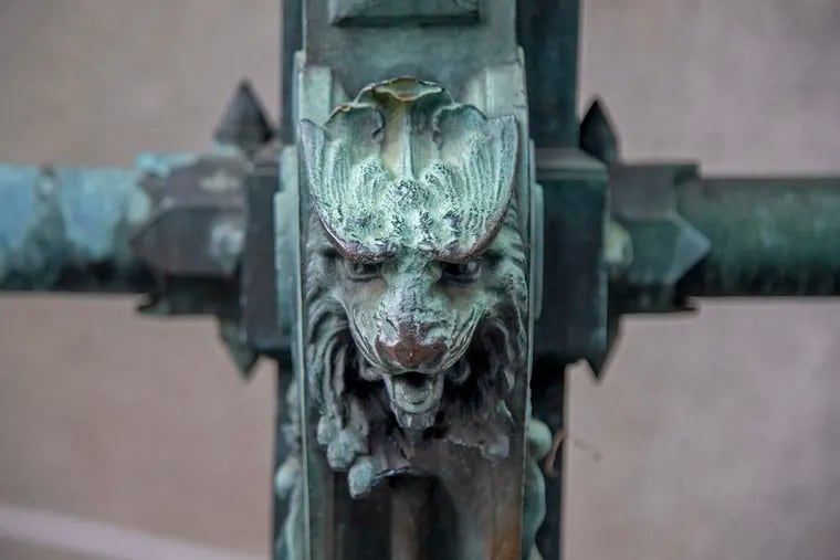 June 28, 2021: There were once almost 150 small lion heads on the ornate bronze spiked railing that surrounds City Hall. They, like most of the statuary on the building - including the big one of William Penn - were designed by Alexander Milne Calder. Less than two dozen of the lions remain after 100 years. And this is one of only two still facing forward.