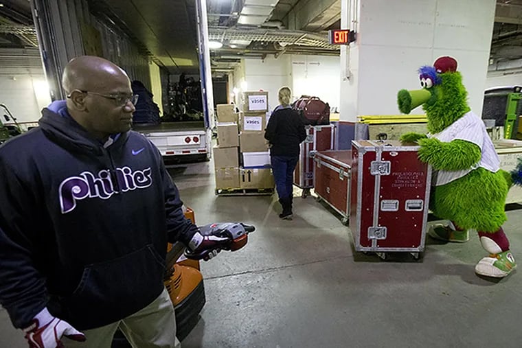 With help from the Phanatic, the Phillies loaded up the equipment truck Friday morning and sent it off to Clearwater to prepare for Spring Training. (Matt Rourke/AP)