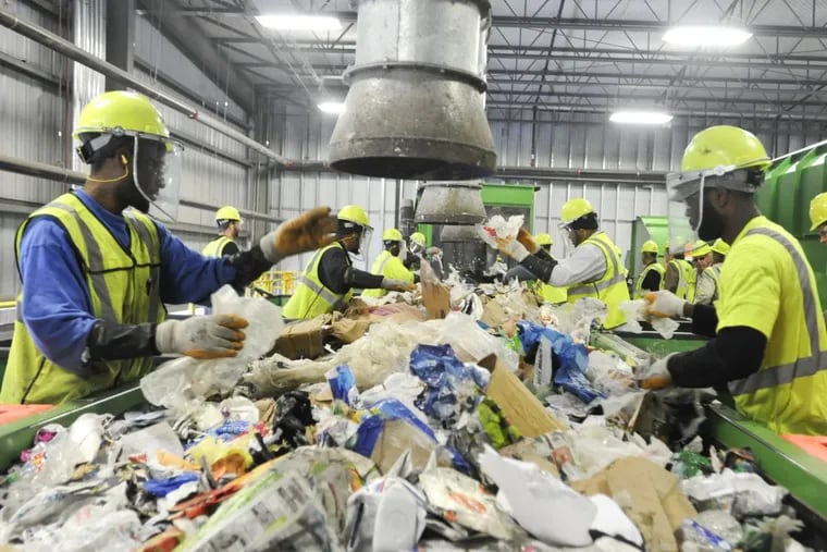 Nonrecyclables are separated out from recyclable materials at a waste-management plant in the Northeast.