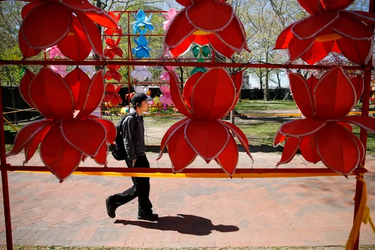 Chinese Lantern Festival flowers decorate Franklin Square near the entrance at Seventh and Race Streets. The festival will run through June 12.