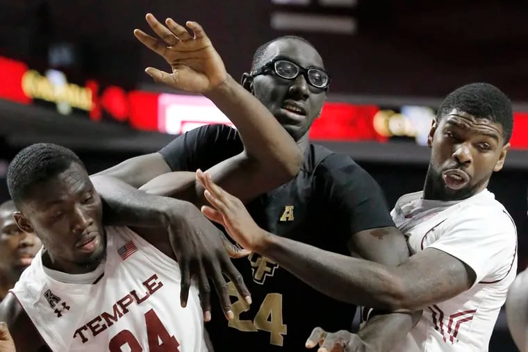University of Central Florida center Tacko Fall, pictured in a game against Temple back in February 2017, helped lead the Knights past the visiting Owls on Wednesday with 16 points and 11 rebounds.