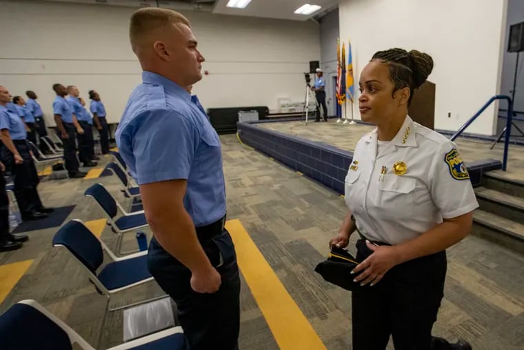 Philadelphia police Commissioner Danielle Outlaw walking past recruits after addressing them at the academy. Police Academy Class 395 at the Philadelphia Police Academy Training Center, Woodhaven Road in Northeast Philadelphia on Monday, July 12, 2021.