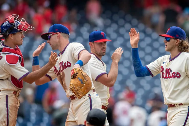 Philadelphia Phillies players celebrate after a game against the Atlanta Braves on Wednesday.