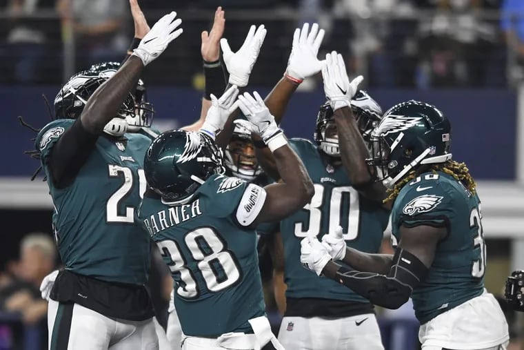Kenjon Barner and some of his Philadelphia Eagles teammates made it rain during their win at the Dallas Cowboys.