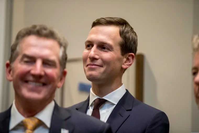 FILE - In this Nov. 14, 2018, file photo, President Donald Trump's White House senior adviser Jared Kushner, right, smiles as former Sen. Jim DeMint of the Heritage Foundation, left, applauds as President Donald Trump recognizes Kushner as he speaks about H. R. 5682, the "First Step Act" in the Roosevelt Room of the White House in Washington, which would reform America's criminal justice system. Kushner is being credited for helping to spearhead what could be the first major bipartisan legislative success of the Trump era: a first-in-a-generation criminal justice reform bill that is expected to pass as soon as this week. (AP Photo/Andrew Harnik, File)