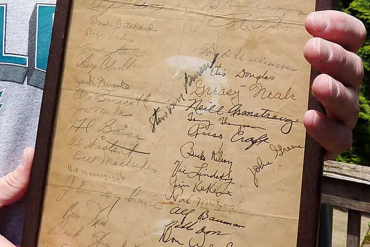 Michael O’Hara of Mantua, N.J., owns a bedcheck sheet signed by 37 members of the 1947 NFL champion Eagles.